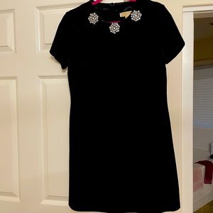 Beautiful  black velvet dress. Pit to pit 18 inch. Shoulder to hem 34 inch
